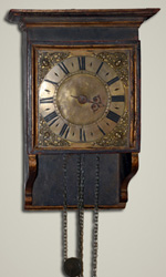Primitive hooded clock