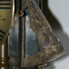 Centre-swing lantern clock detail